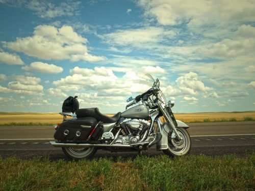 Motorcycle on a prairie road.