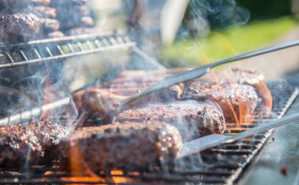 Burgers on a grill.