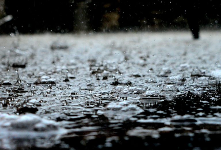 Rain falling during flood.