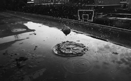 Ball hitting water during flood.