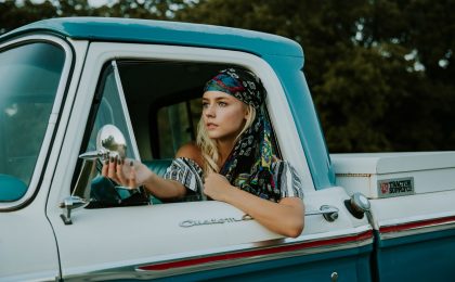 Woman in truck without commercial auto.