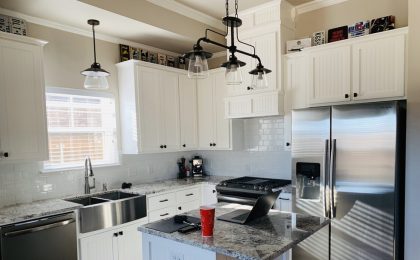 A modern kitchen in a rowhouse.