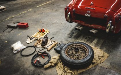 Red car being fixed.