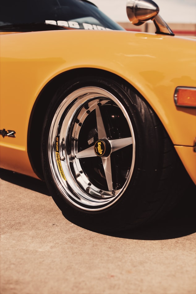 Tire on yellow car.