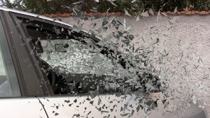 Car window breaking.