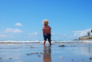 Baby on beach.