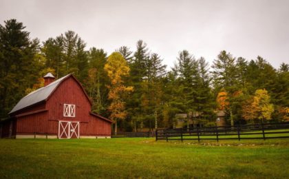 House on farm with barn.