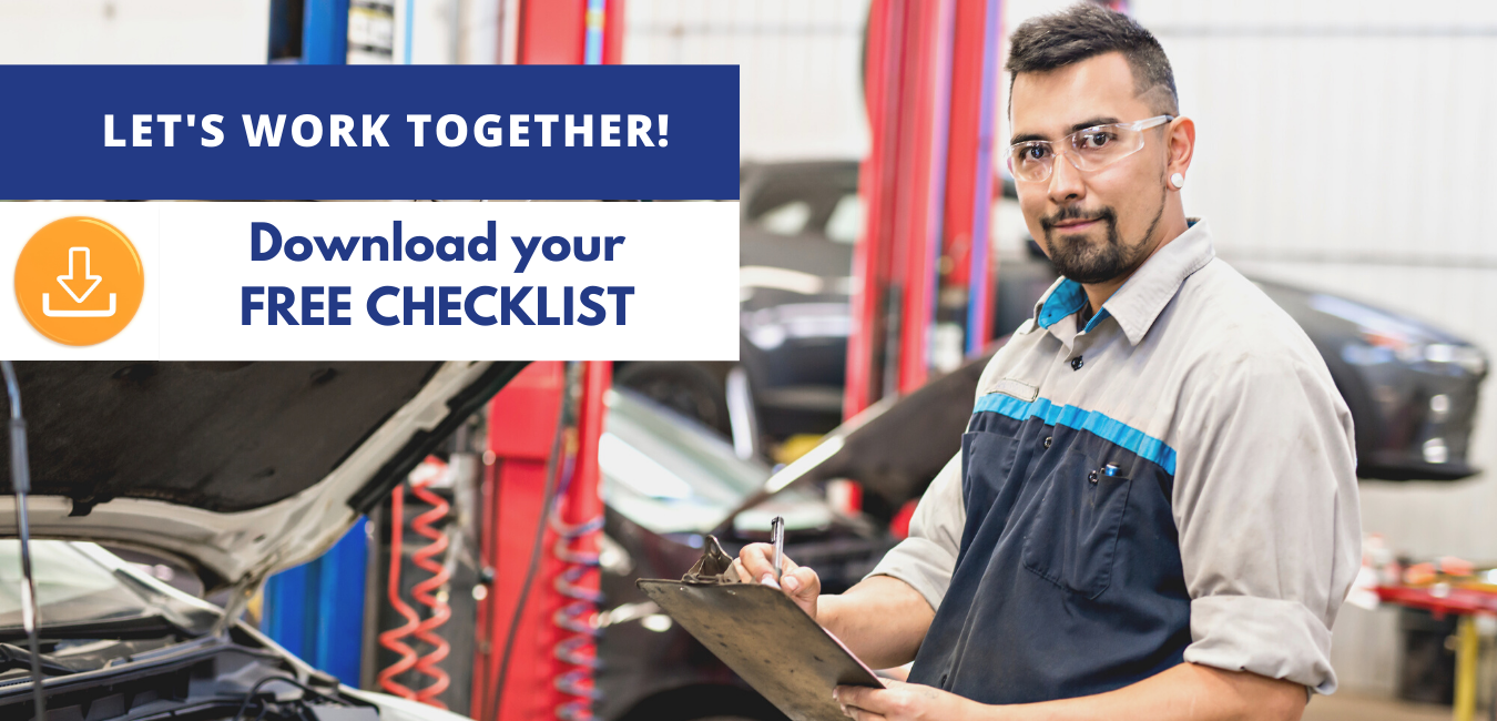 Mechanic using insurance checklist.