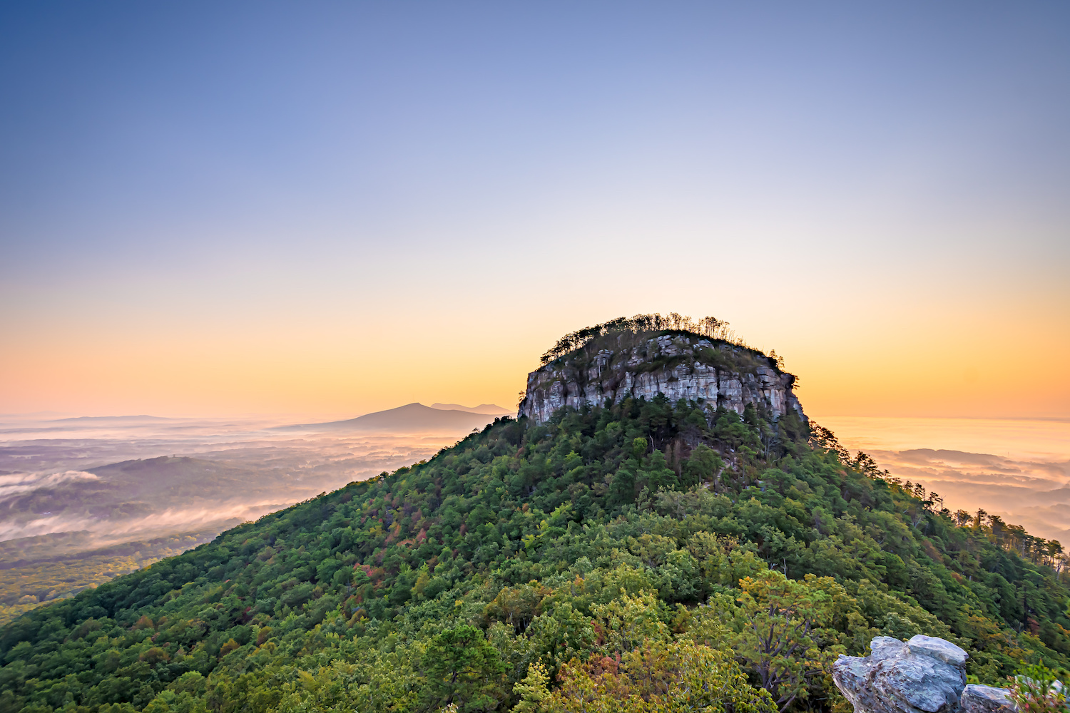 Sunrise view from Little Pinnacle Overlook at Pilot Mountain State Park, North Carolina,USA.